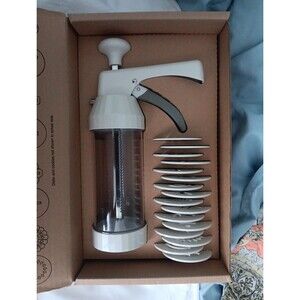 The Pampered Chef 1525 Cookie Press with 16 Discs - White